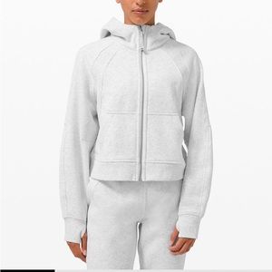 Lululemon Scuba Sweater. In dark Heather grey. Size M/L worn a few times.